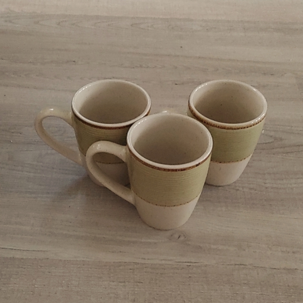 Three Gibson coffee mugs